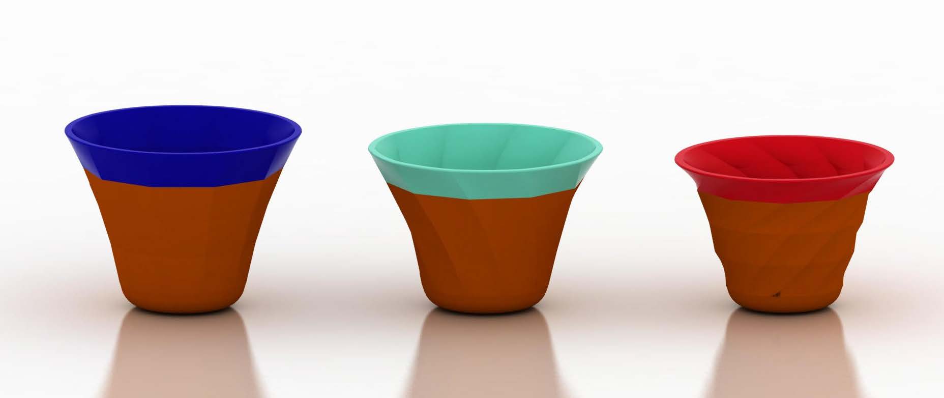 Three cone-shaped terracotta pots with colored blue, teal and red rims arranged in a row on a light reflective surface